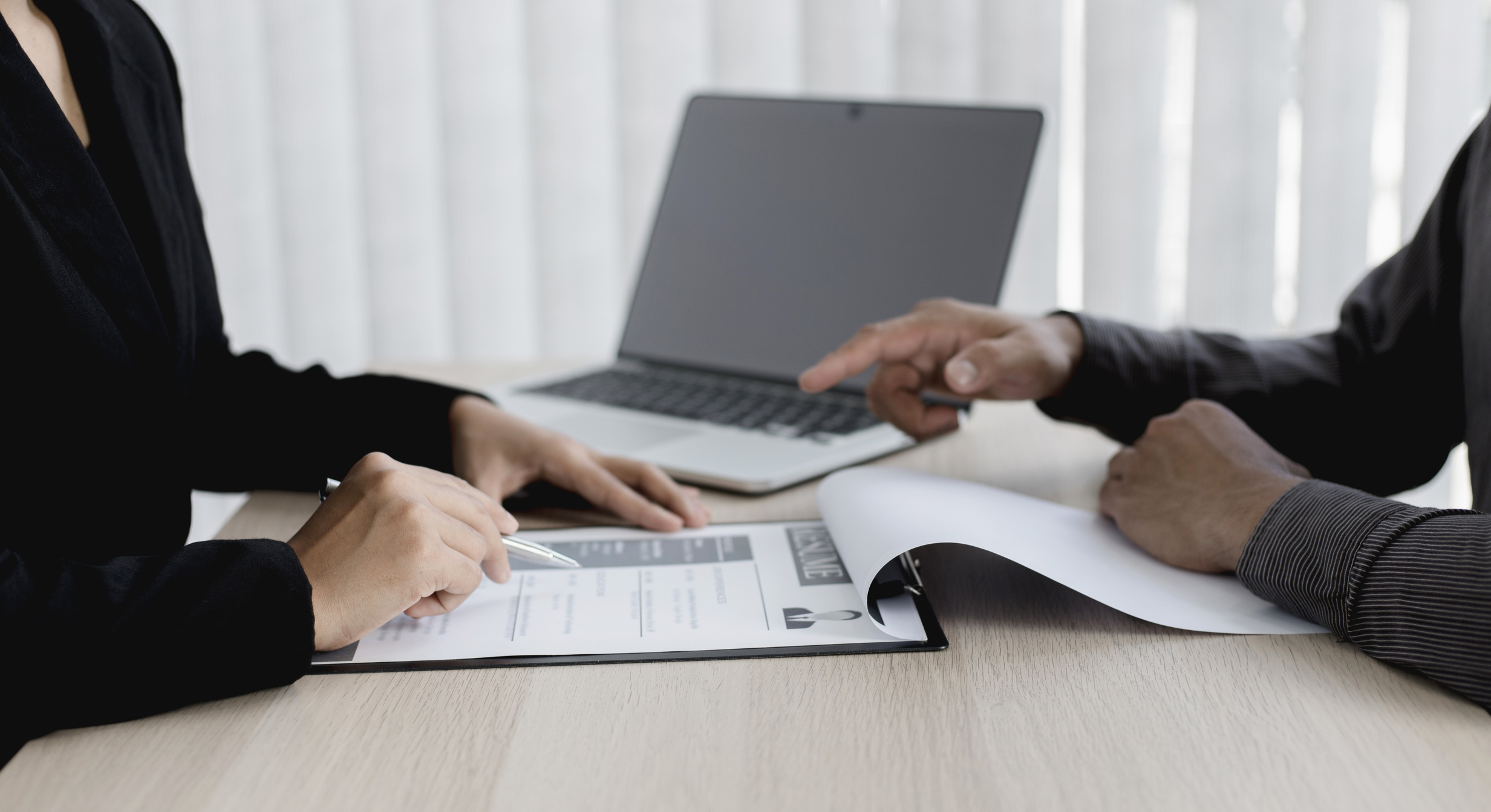 Managers Reading Applicants Resume